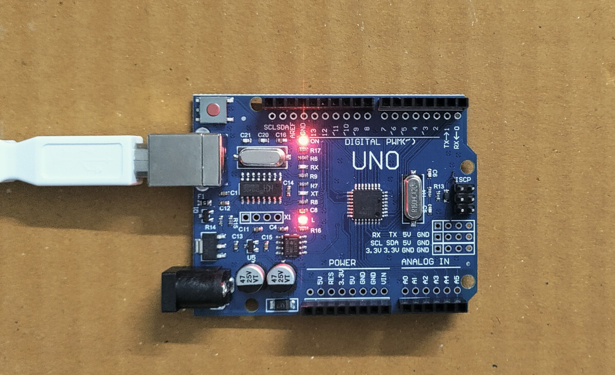 Arduino Uno compatible board running a Rust blinky program